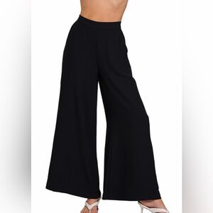 A135. Black Wide-Leg Draped Trouser Pants